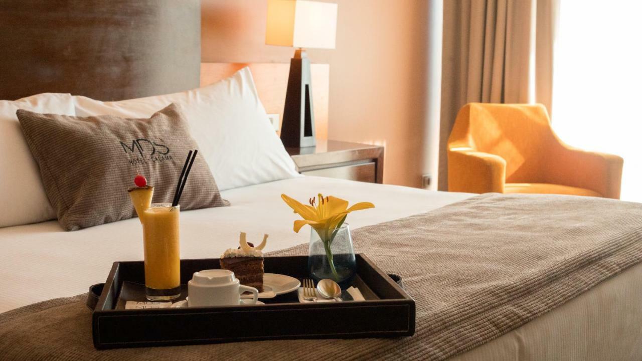 Mds Hotel كالاما المظهر الخارجي الصورة A room at the hotel