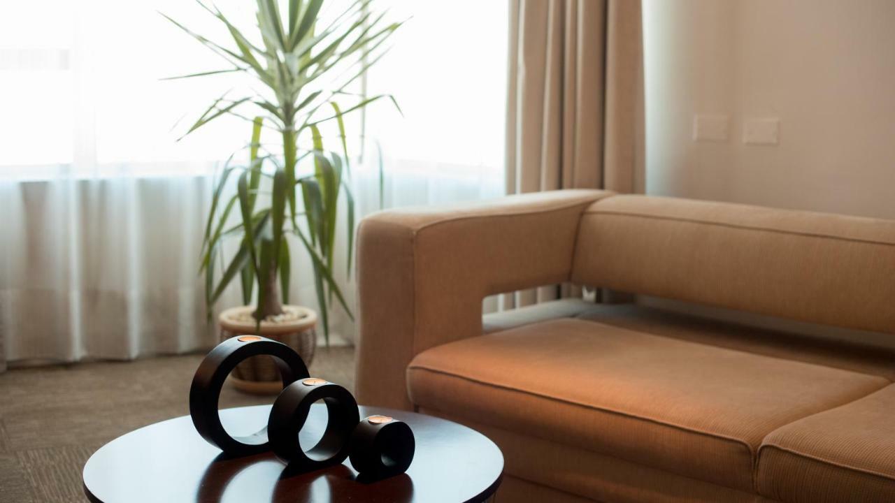 Mds Hotel كالاما المظهر الخارجي الصورة A living room