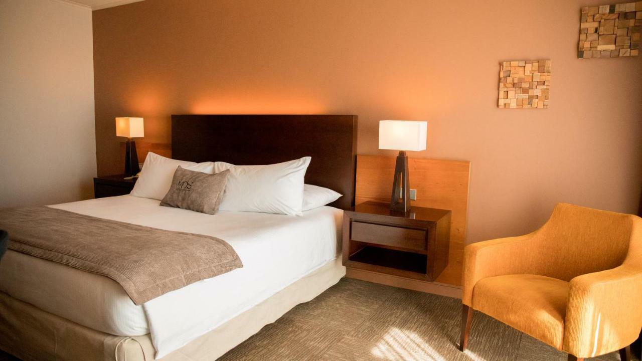Mds Hotel كالاما المظهر الخارجي الصورة A bedroom at the hotel