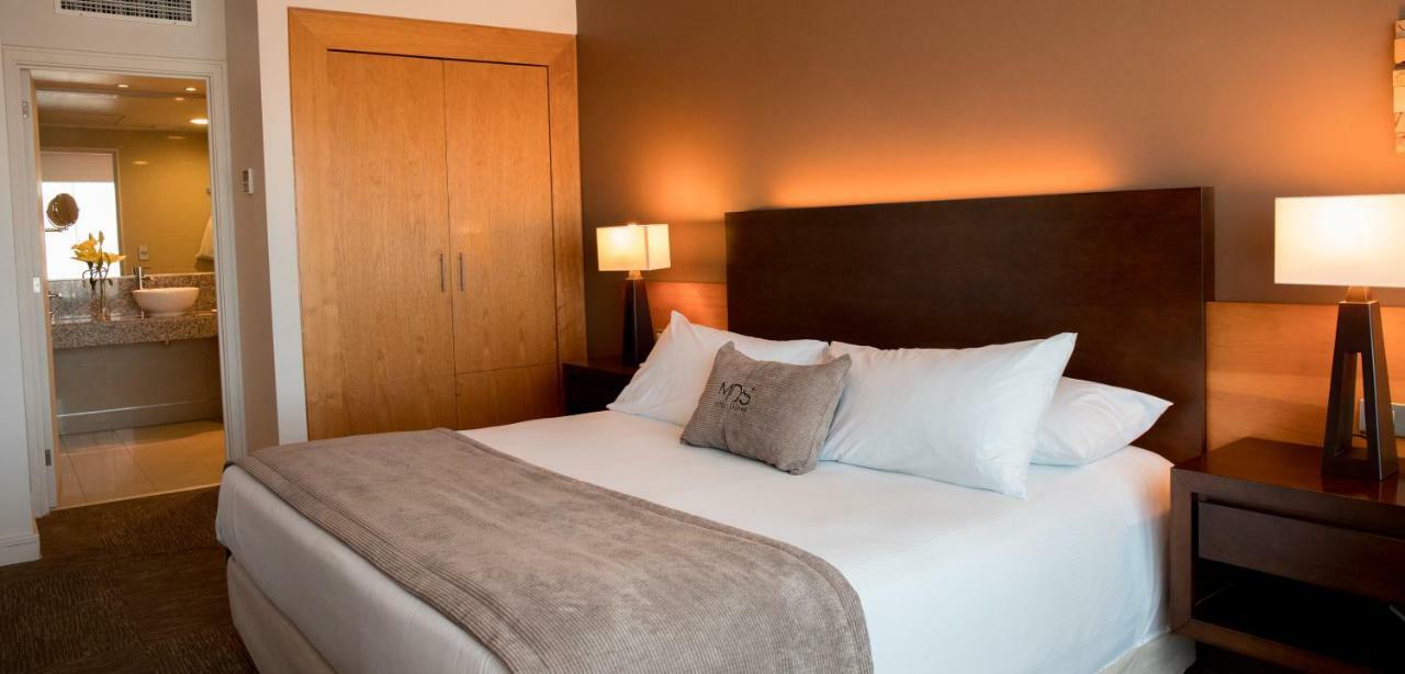 Mds Hotel كالاما المظهر الخارجي الصورة A bedroom at the hotel