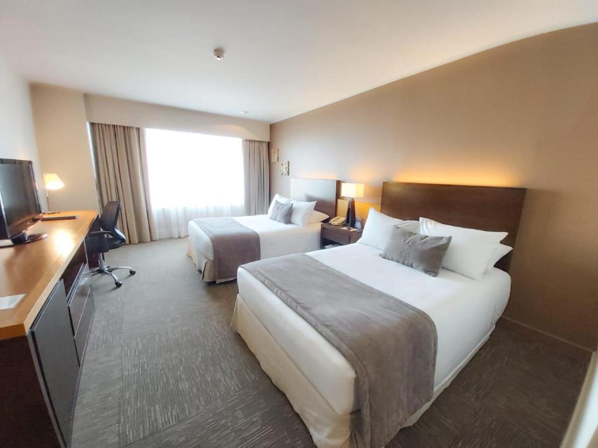 Mds Hotel كالاما المظهر الخارجي الصورة A typical hotel room